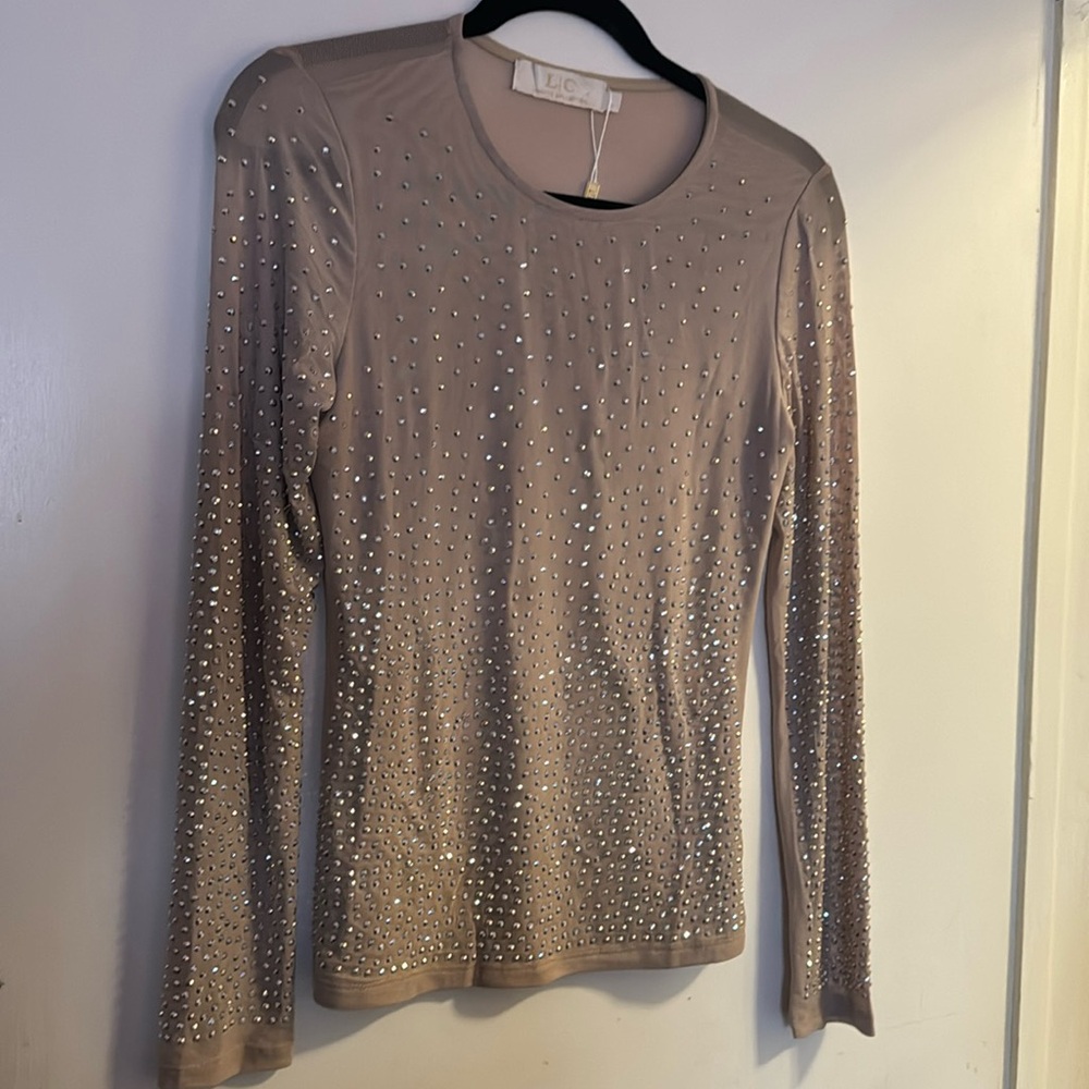 Long sleeved semi-sheer studded long sleeved top!